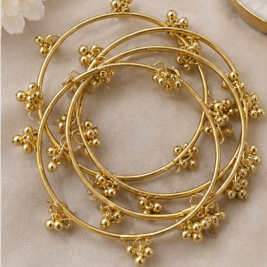 Gold ghungroo bead bangles set