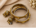 Gold Coil Bangles with Ruby Crystal Stones