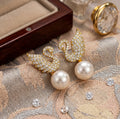 Gold Swan Zircon Pearl Drop Earrings